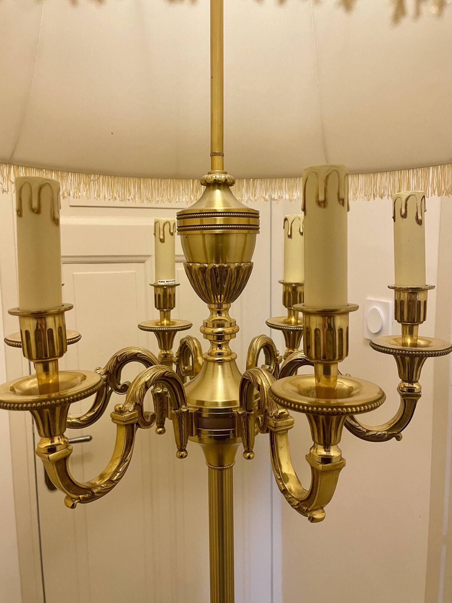 Bronze floor lamp by Lucien Gau, with a six-light shade model 16136.