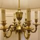 Bronze floor lamp by Lucien Gau, with a six-light shade model 16136.