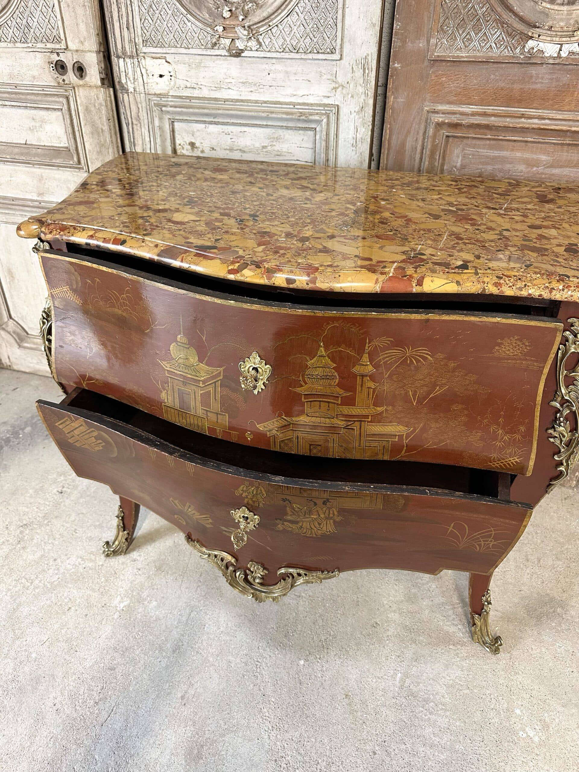 Louis XV style commode in red lacquer from the 1900s.