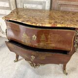 Louis XV style commode in red lacquer from the 1900s.