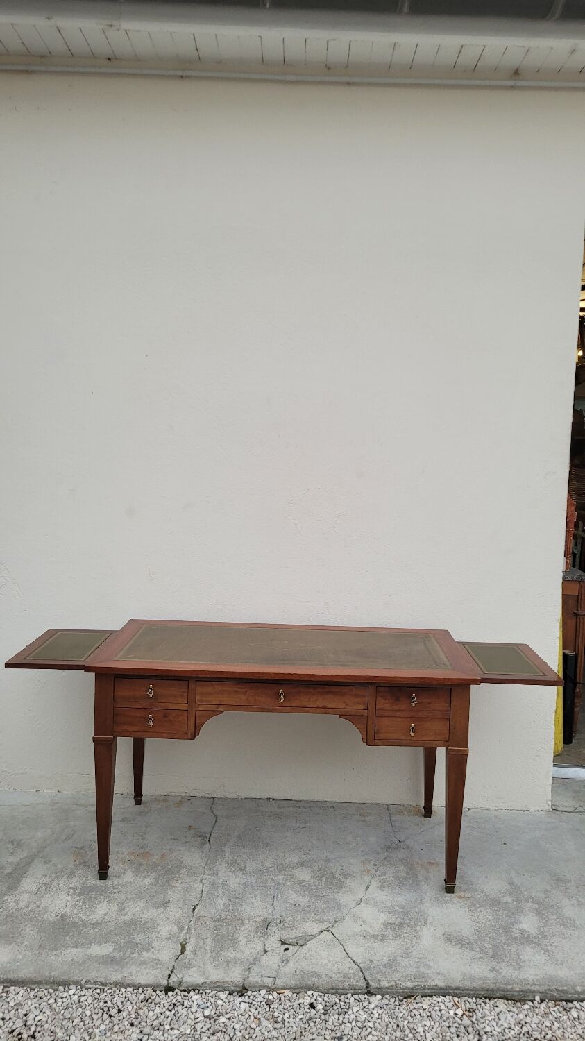 Louis XVI style flat desk in 19th century mahogany