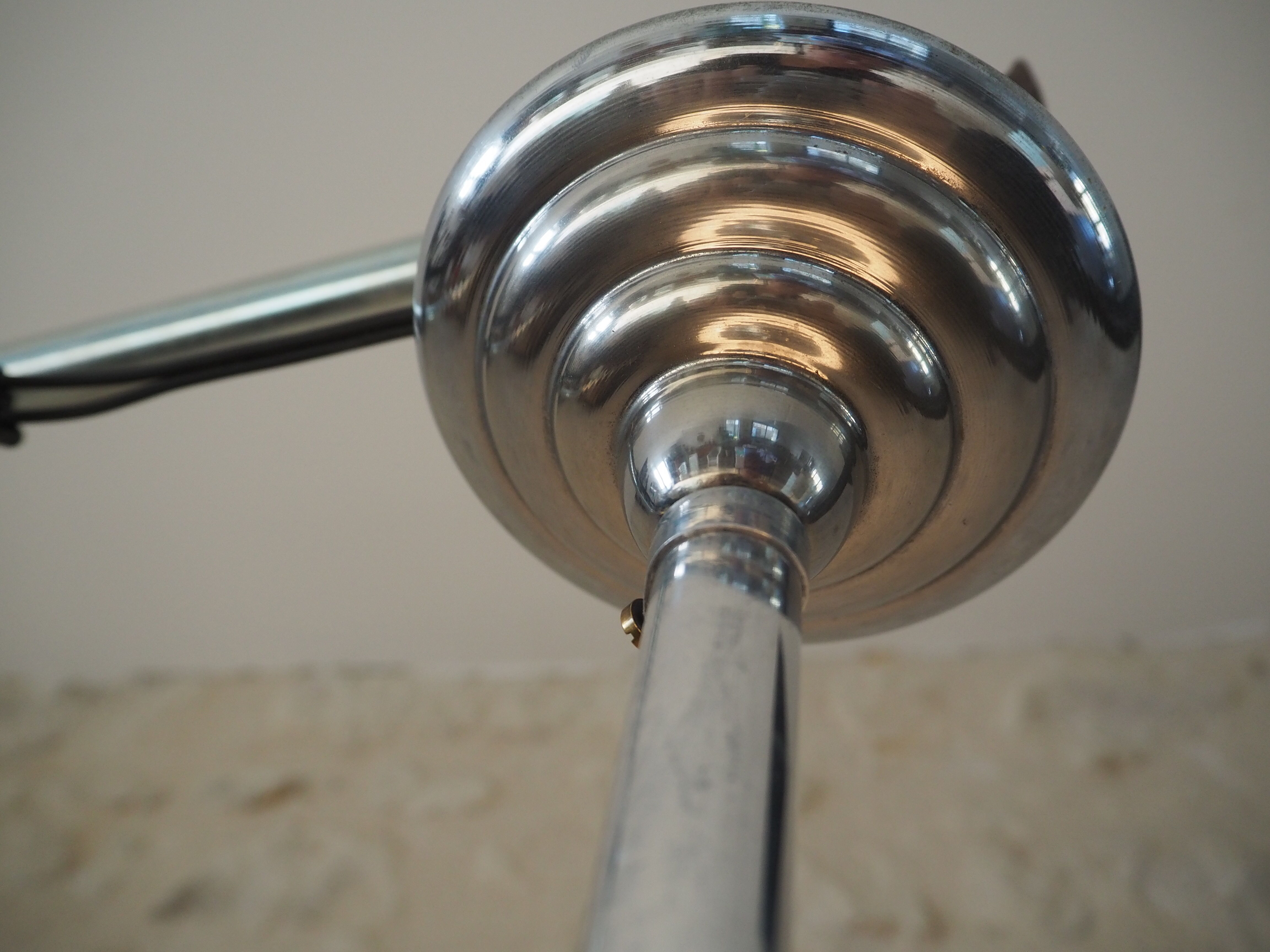 Art deco globe pendant light in white opaline and aluminum rod