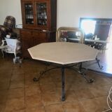 Travertine and wrought iron dining table