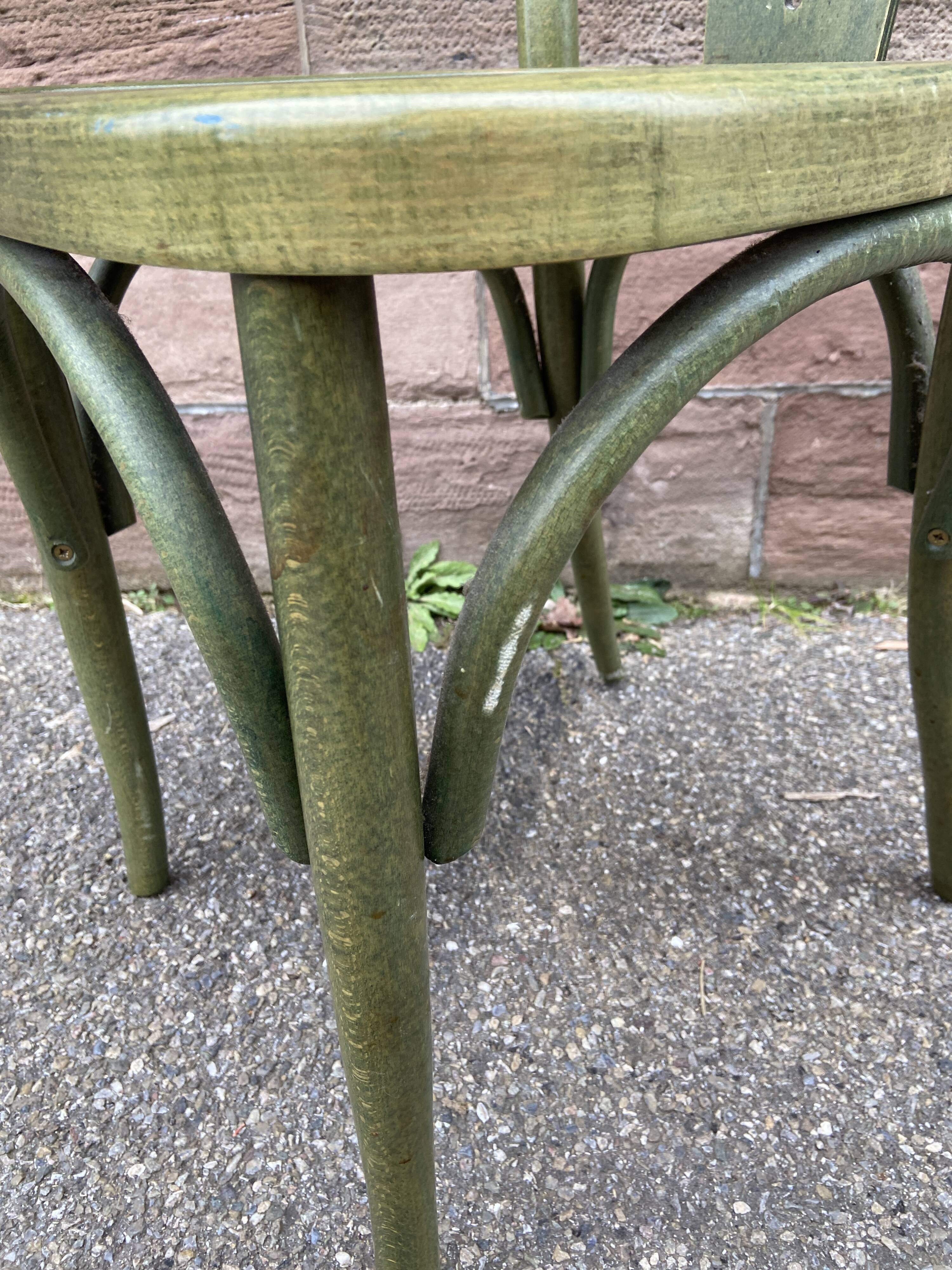 2 curved wooden bistro chairs