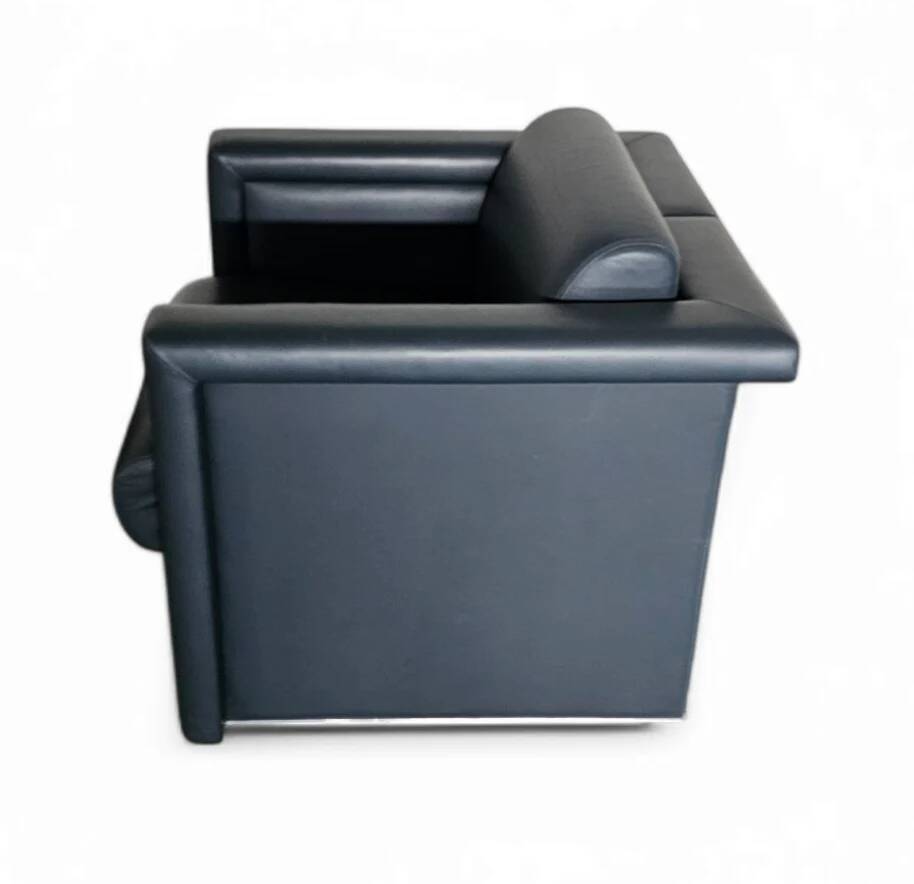 Pair / Trix and Robert Haussmann / Dark grey leather chairs by Knoll