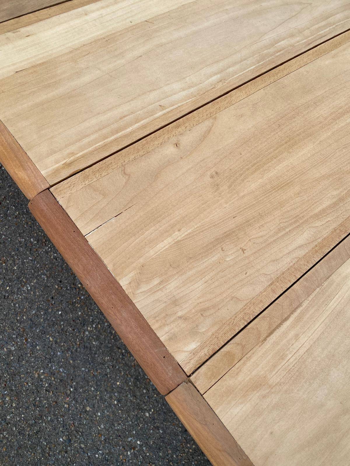 Large stripped solid oak dining table in Louis XVI style with 3 extensions.