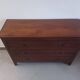 Three-drawer chest of drawers in exotic wood