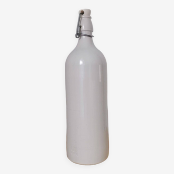 M. K. white stoneware bottle M