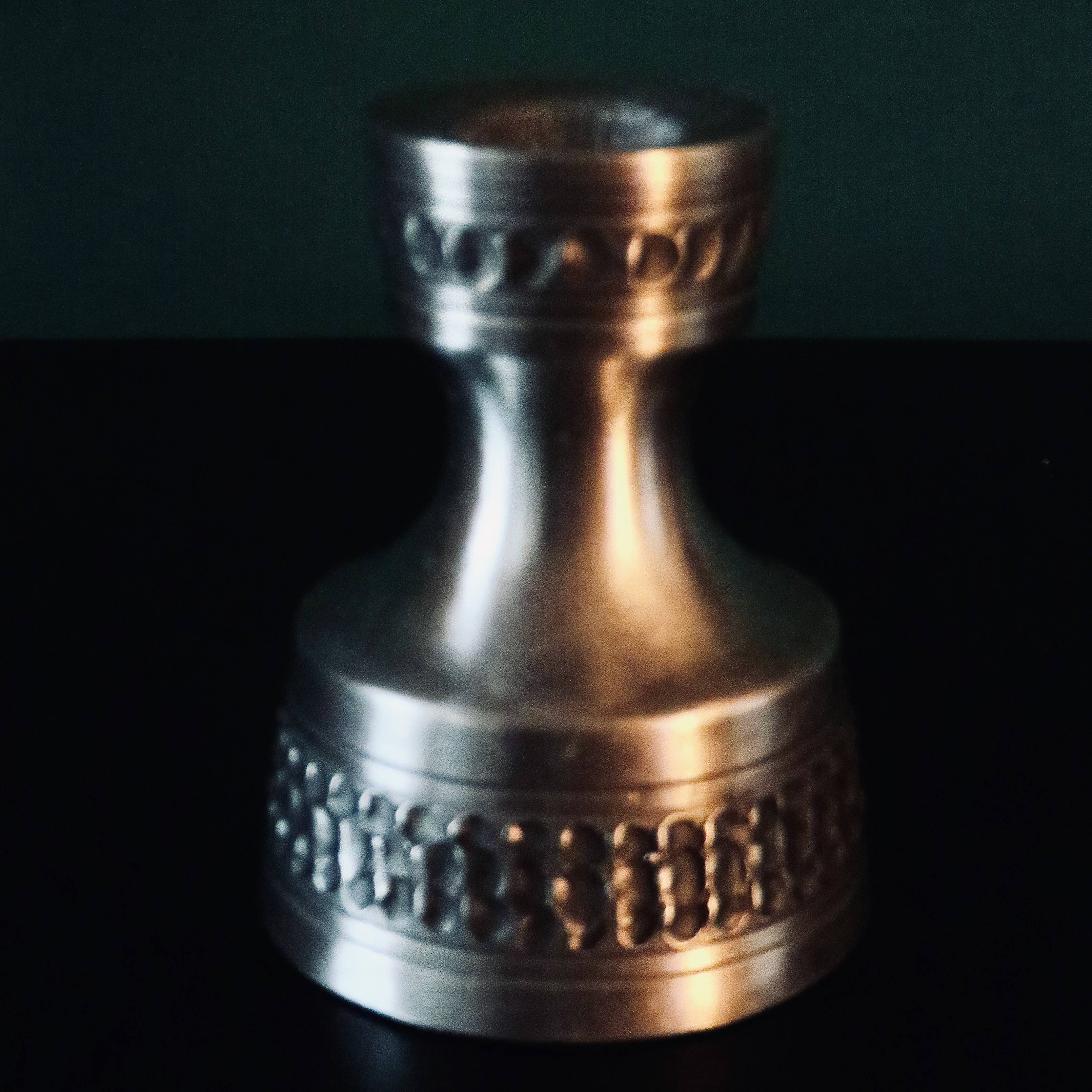 Pair of white pewter candlesticks decorated with bas-relief. "Perletin". Norway 1960