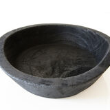 Cut / empty pocket in burning wood. shou-sugi-ban
