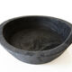 Cut / empty pocket in burning wood. shou-sugi-ban