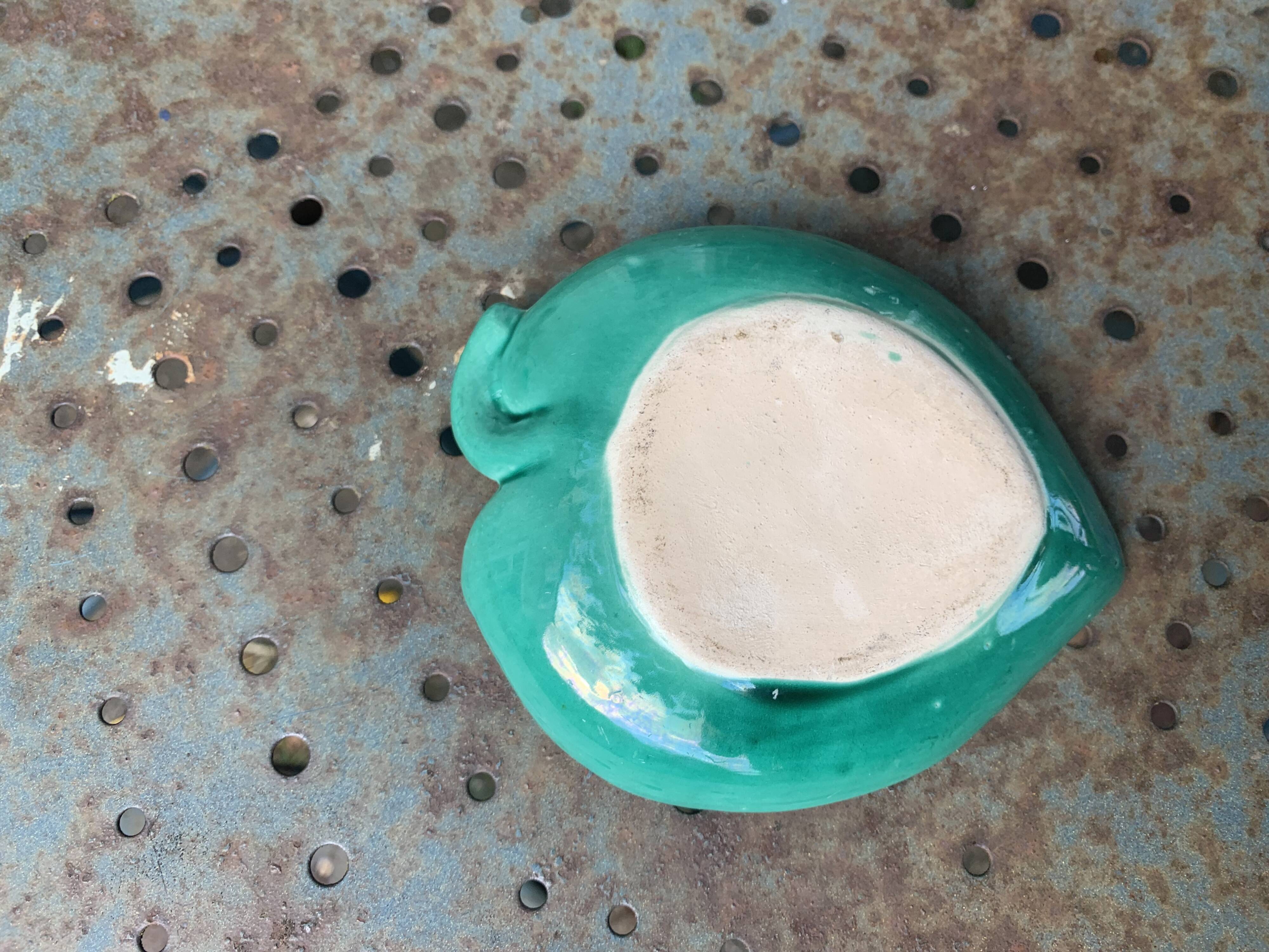 Empty pocket, duck soap dish on green barbotine leaf vintage