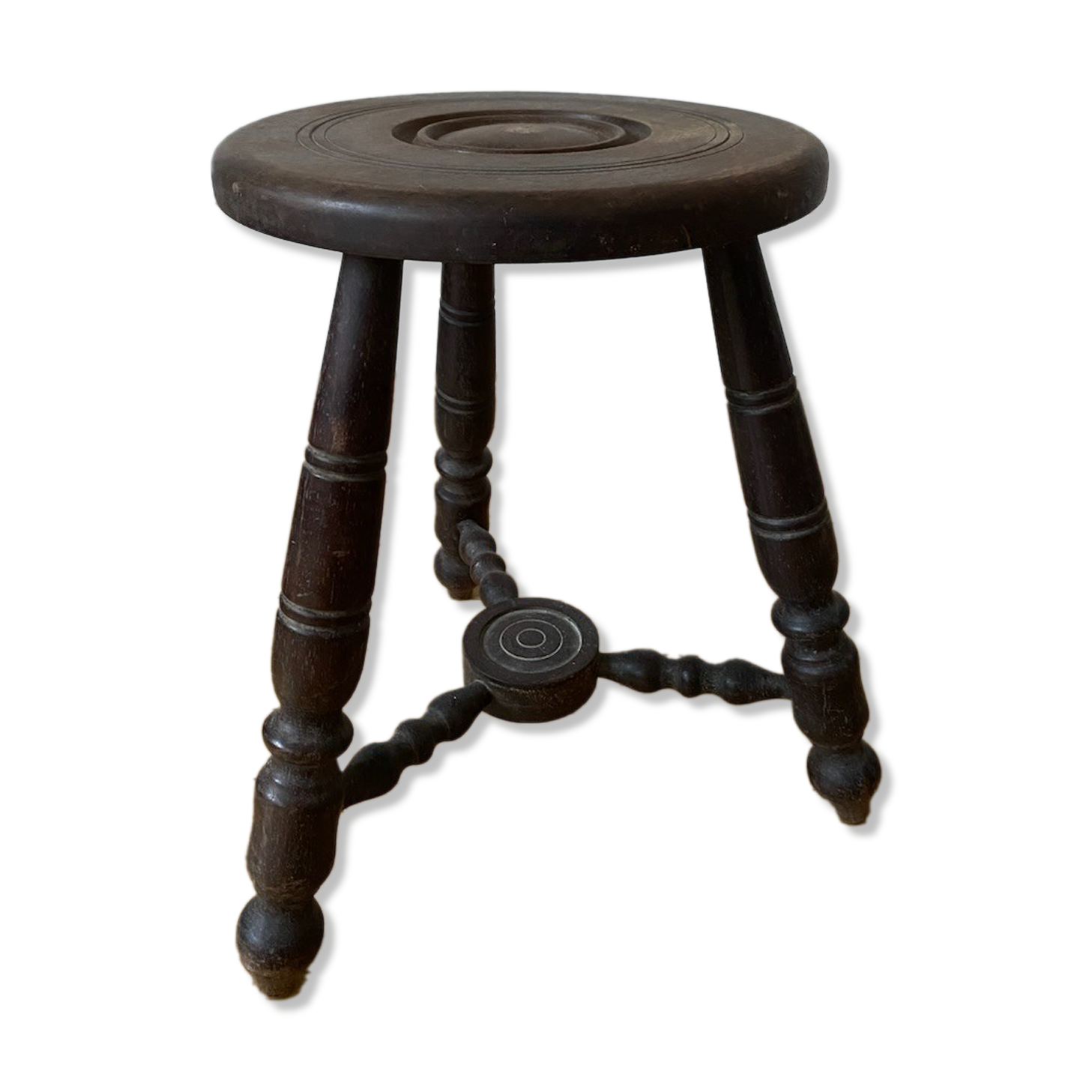 Turned wooden tripod stool
