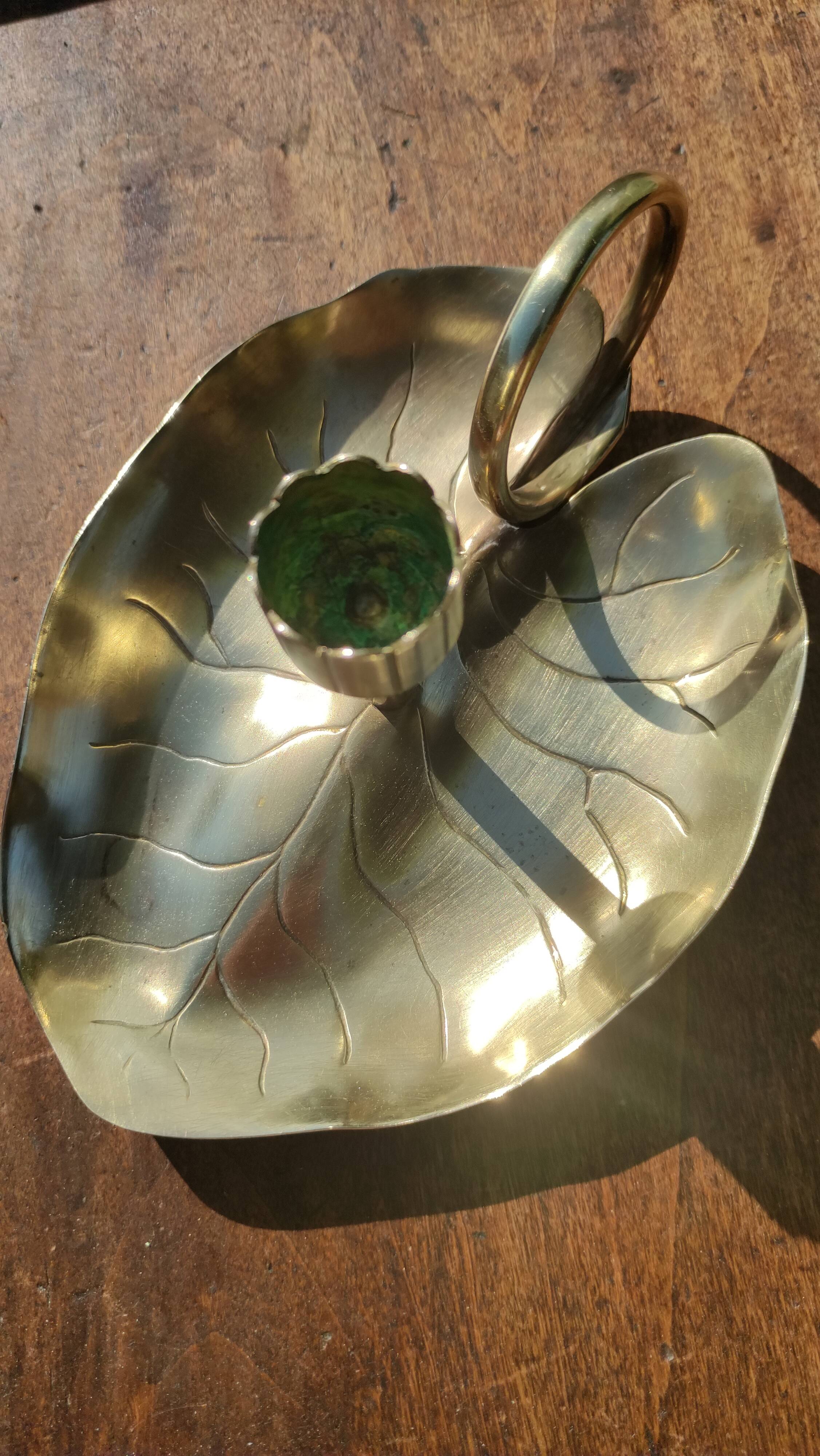 Vintage candle holder in golden brass