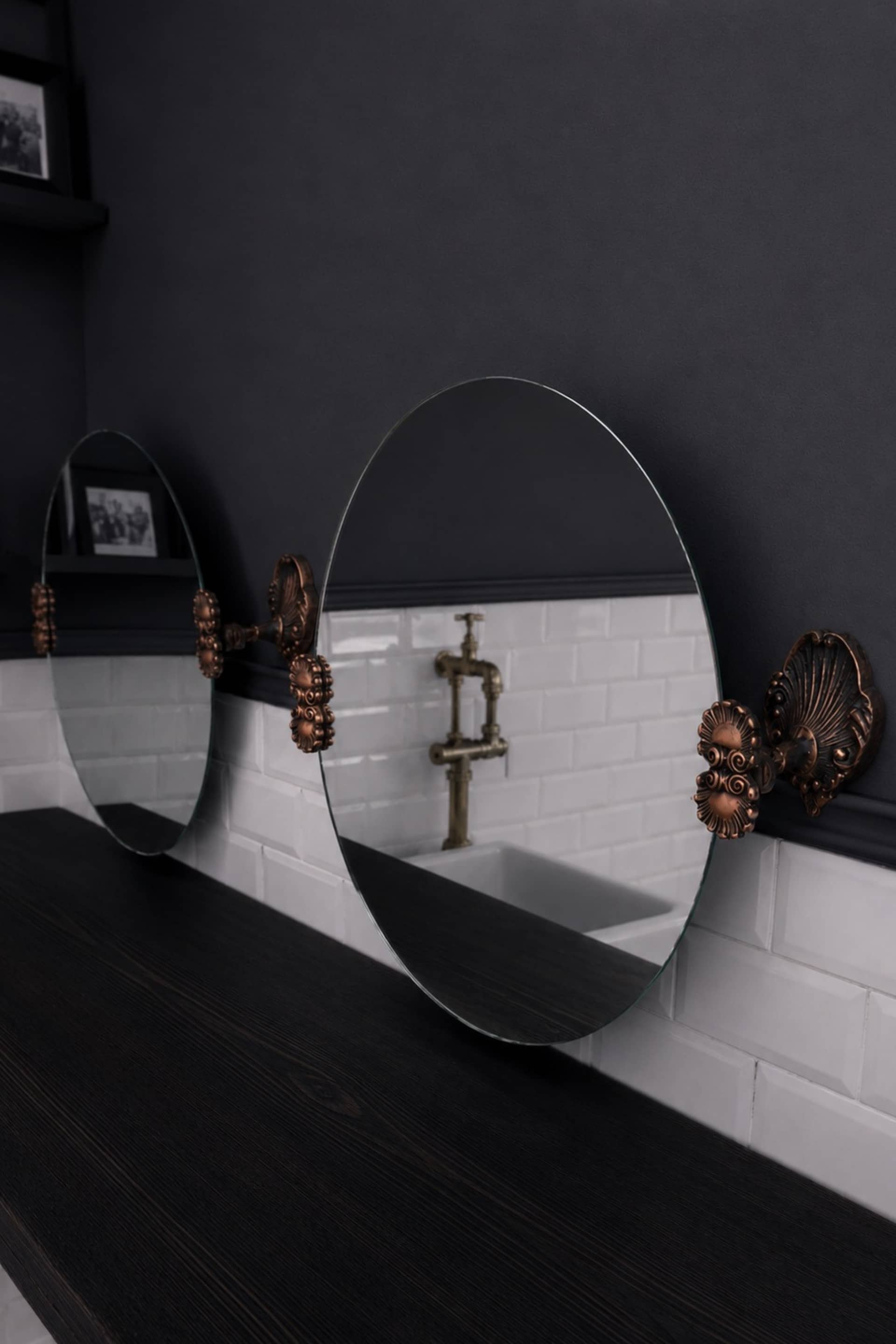 2 round mirrors made of copper alloy, 1940s-1950s
