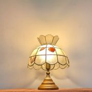 Vintage lamp in wood, brass and mother-of-pearl.