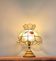 Vintage lamp in wood, brass and mother-of-pearl.