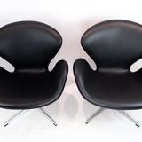 A pair of Swan chairs, model 3320, designed by Arne Jacobsen in 1958