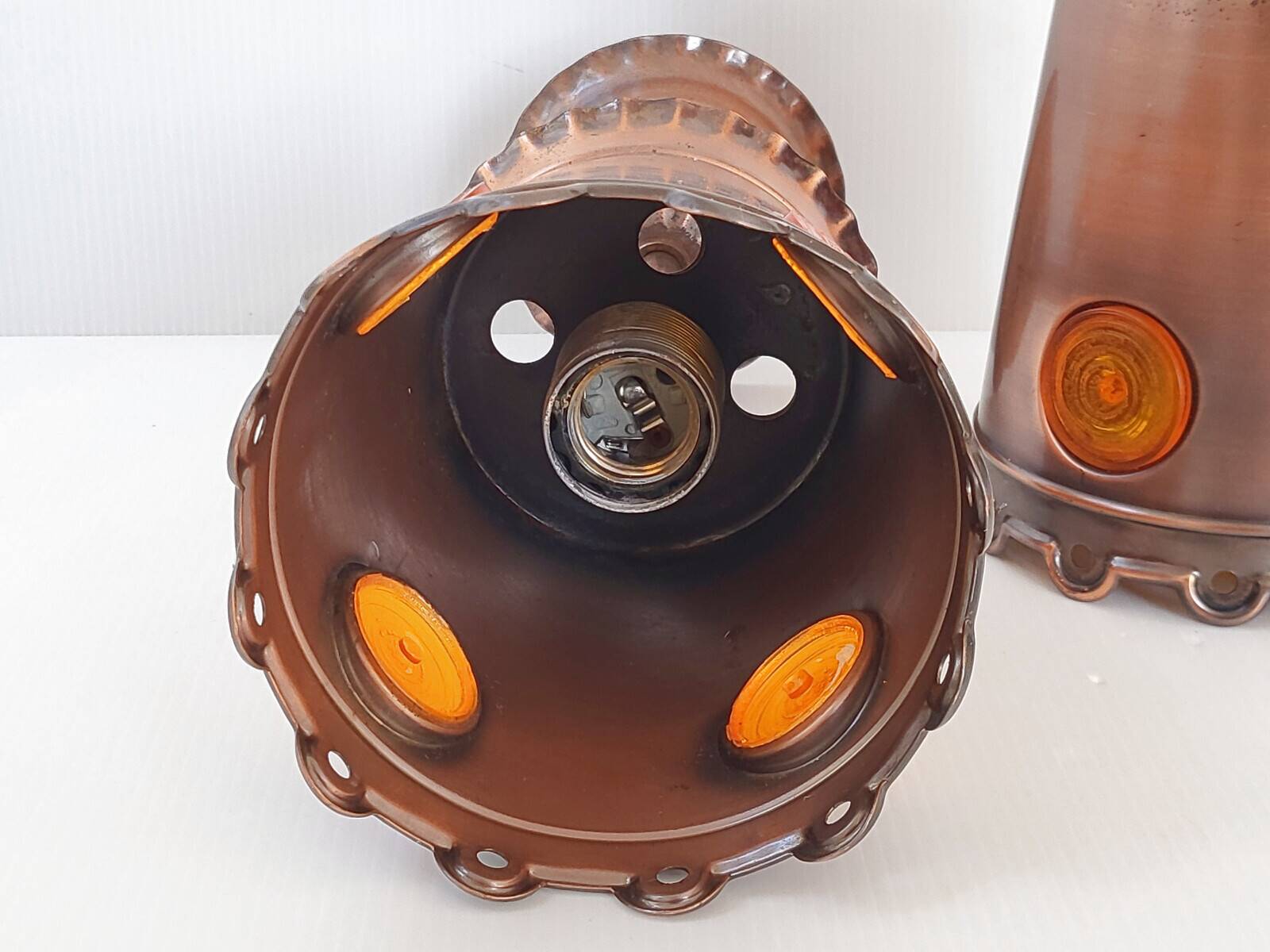 Pair of vintage 1970s brutalist suspensions in copper & orange plastic