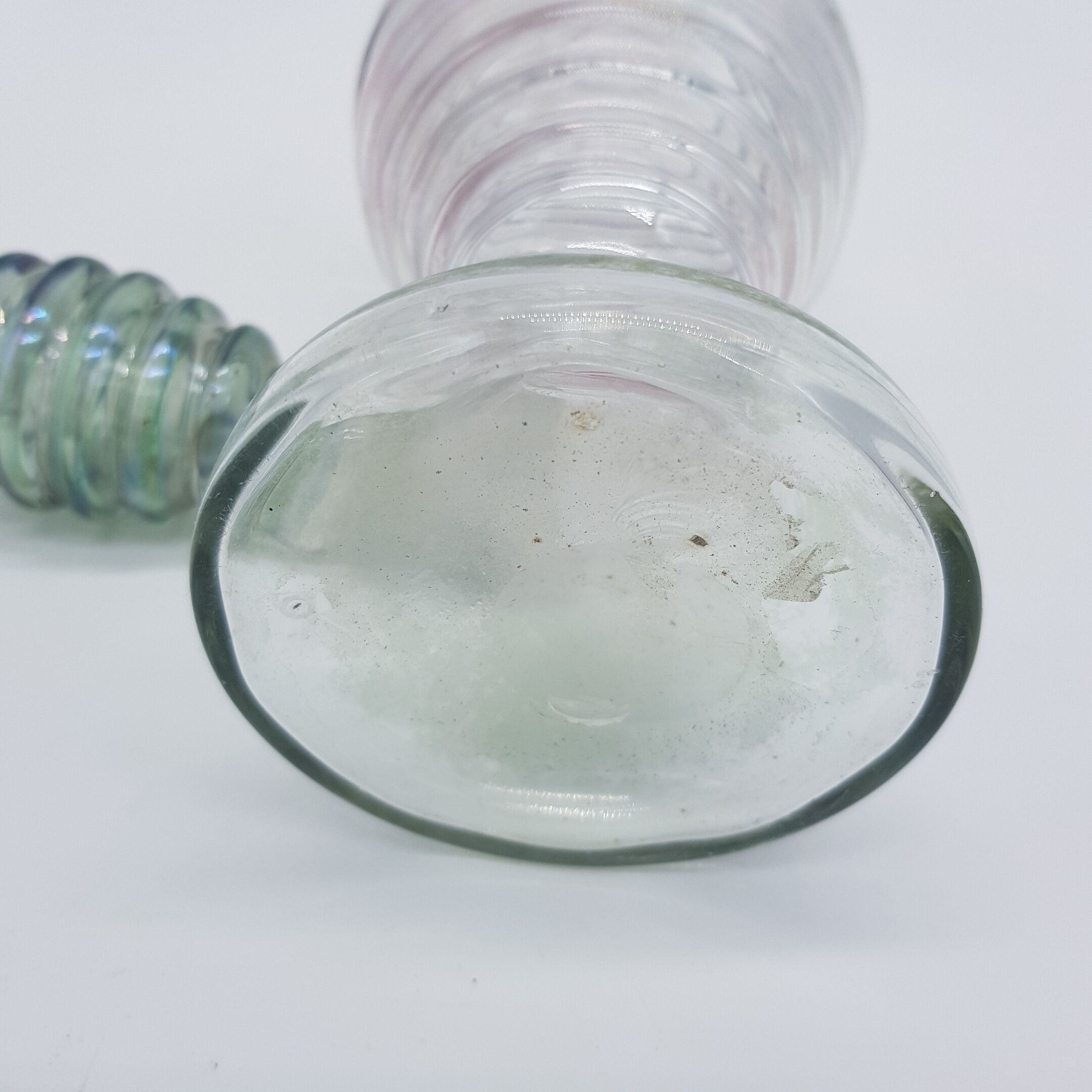Old carafe ringed iridescent glass blown