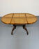 Vintage dining table with a cane top by Mundus from the 1970s.