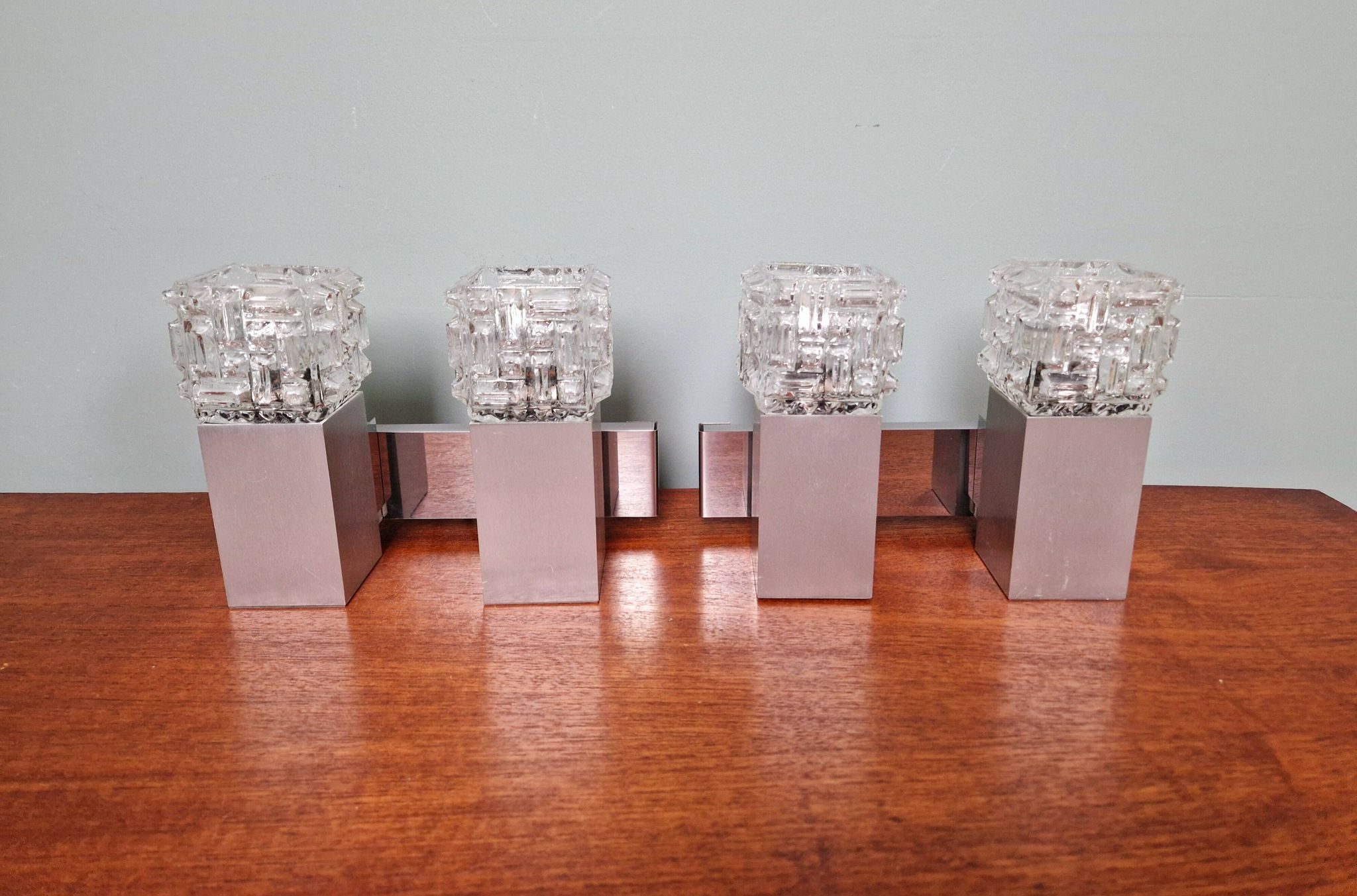 Pair of brushed aluminum and crystal wall lights, 1970s