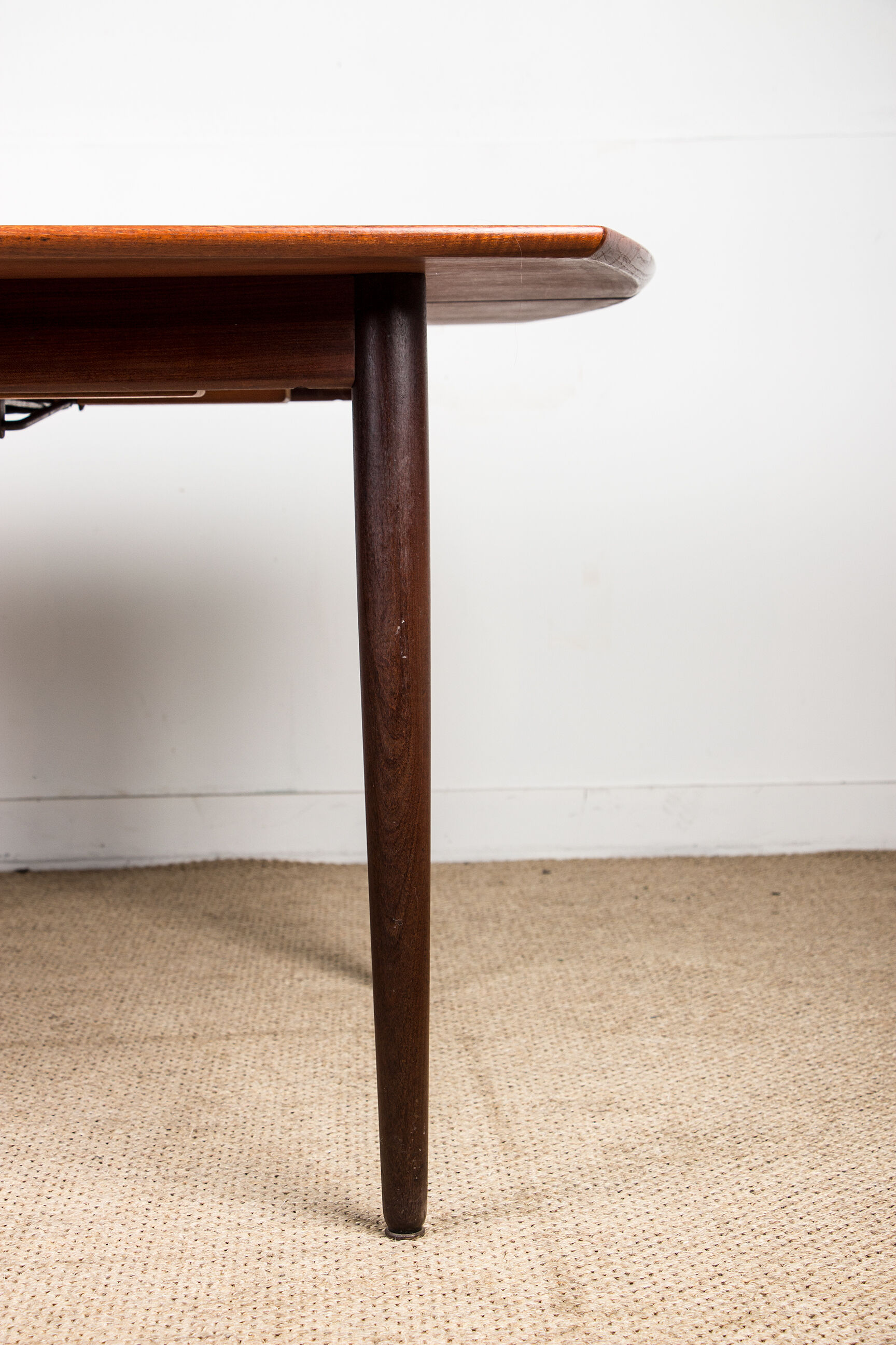 Expandable square teak dining table by Henry Walter Klein 1960