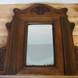 Old pediment mirror carved in wood