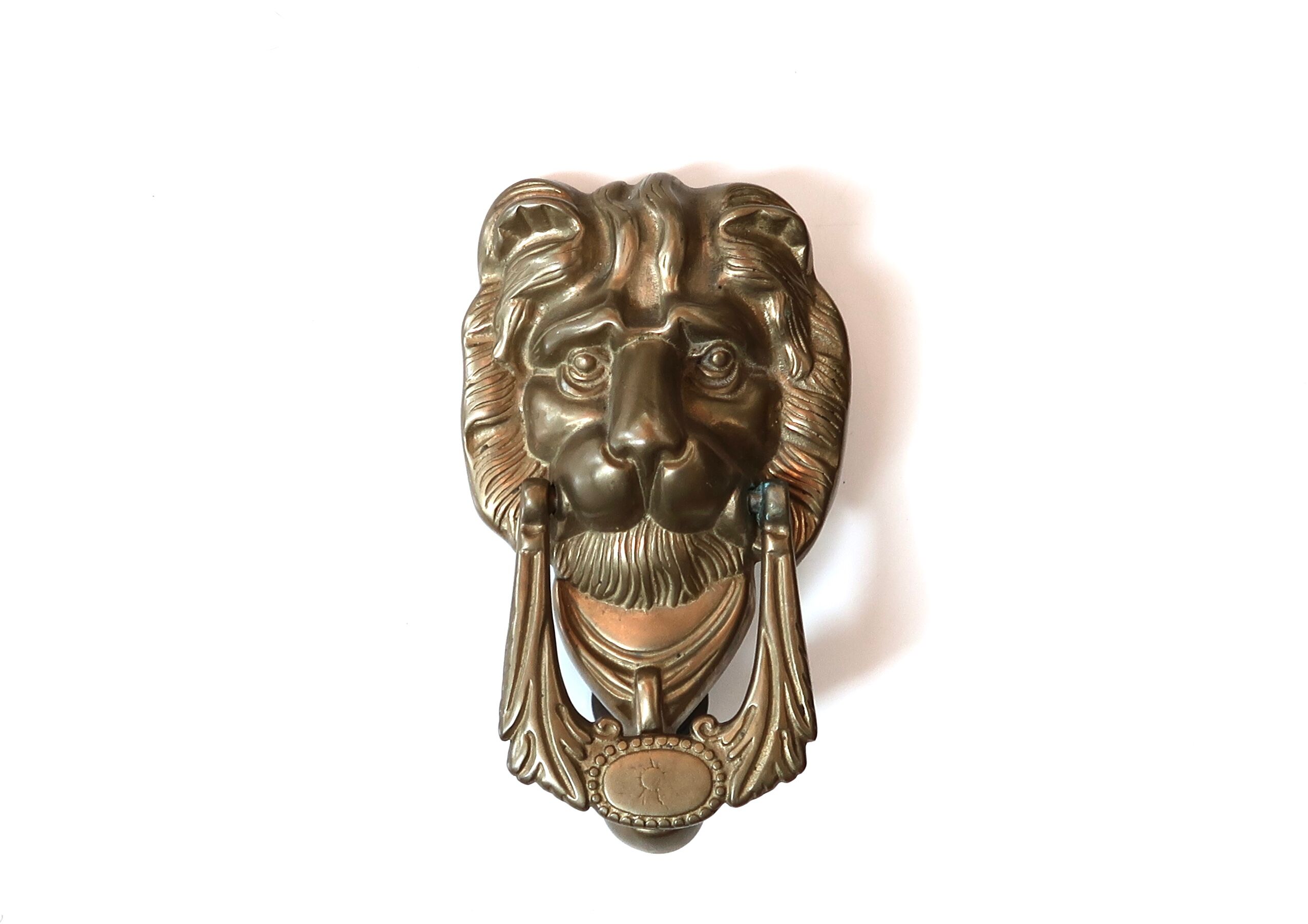 Lion-shaped brass door knocker, 70s