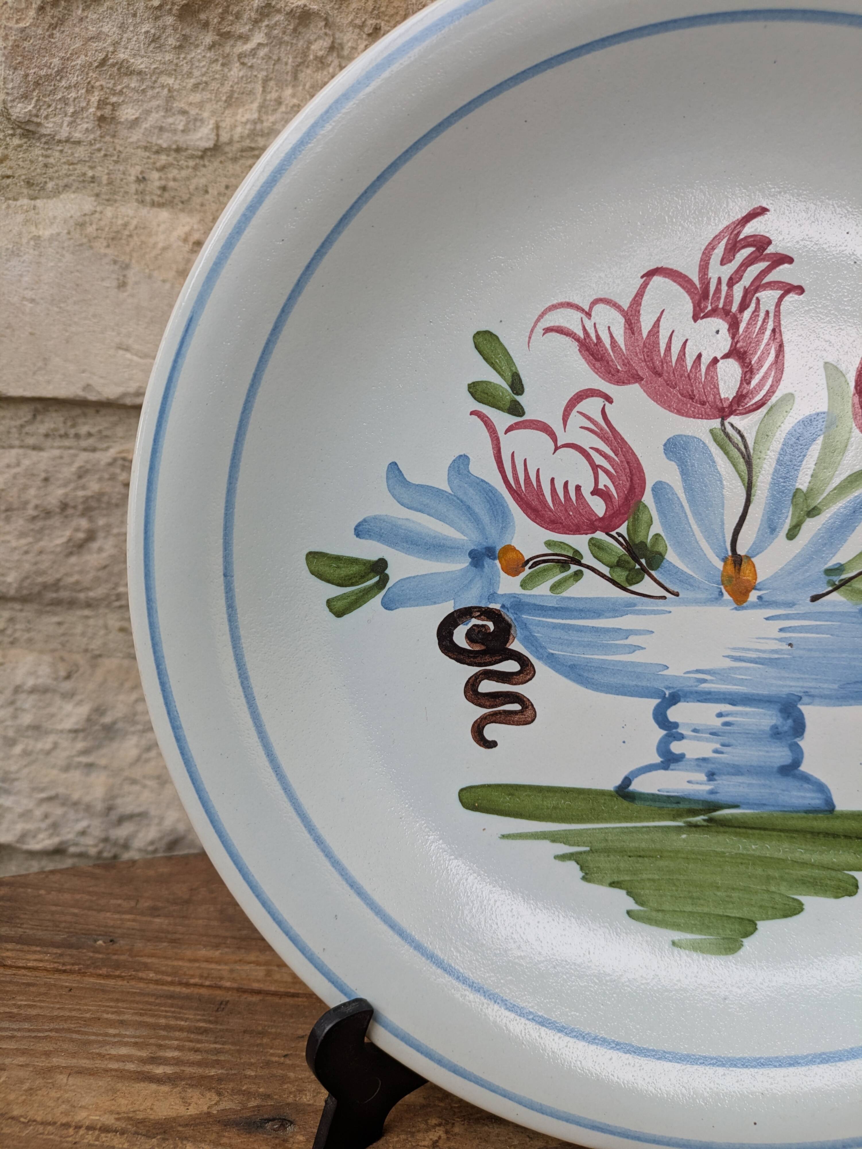 Plate with hand-painted flower bouquet on light blue background 25cm