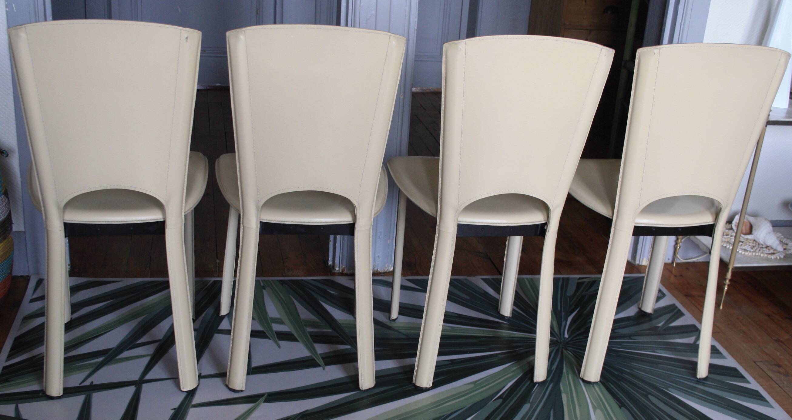 Set of 4 beige leather chairs from the 80s in Italy