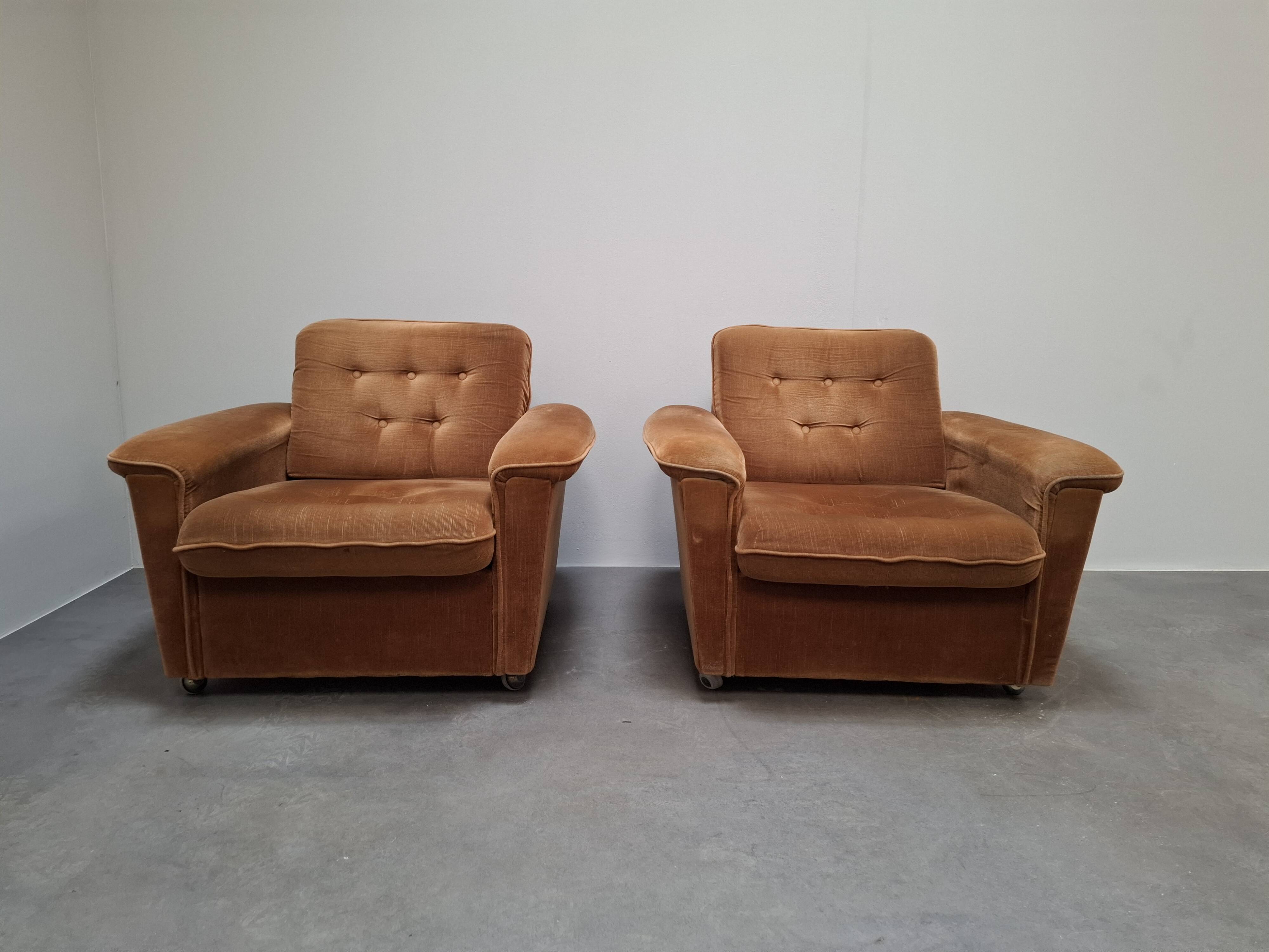 Pair of Mid-Century Modern Czech Lounge Armchairs with Rolling Casters