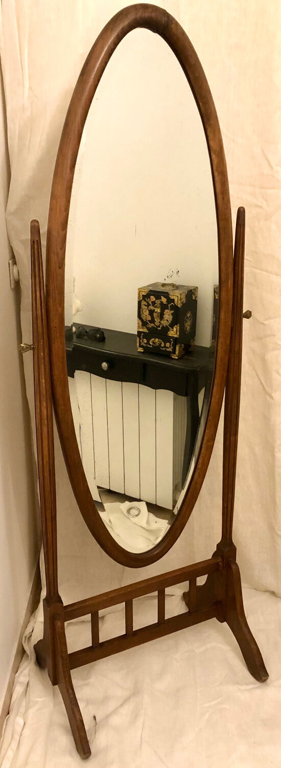 Old large psychic mirror on wooden stand