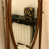 Old large psychic mirror on wooden stand