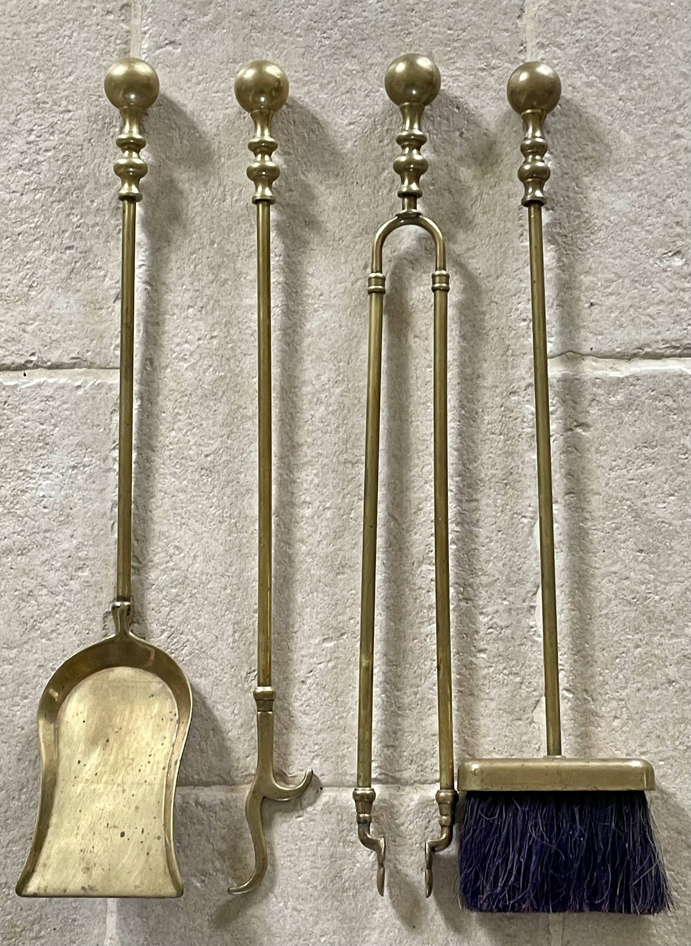 Brass fireplace accessory set with vintage stand