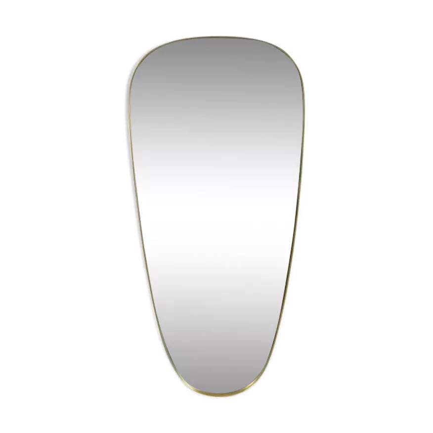 Rear view mirror and free form brass outline
