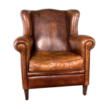 Vintage armchair in patinated sheep leather