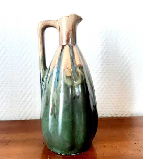 Set of art nouveau ceramic pitchers