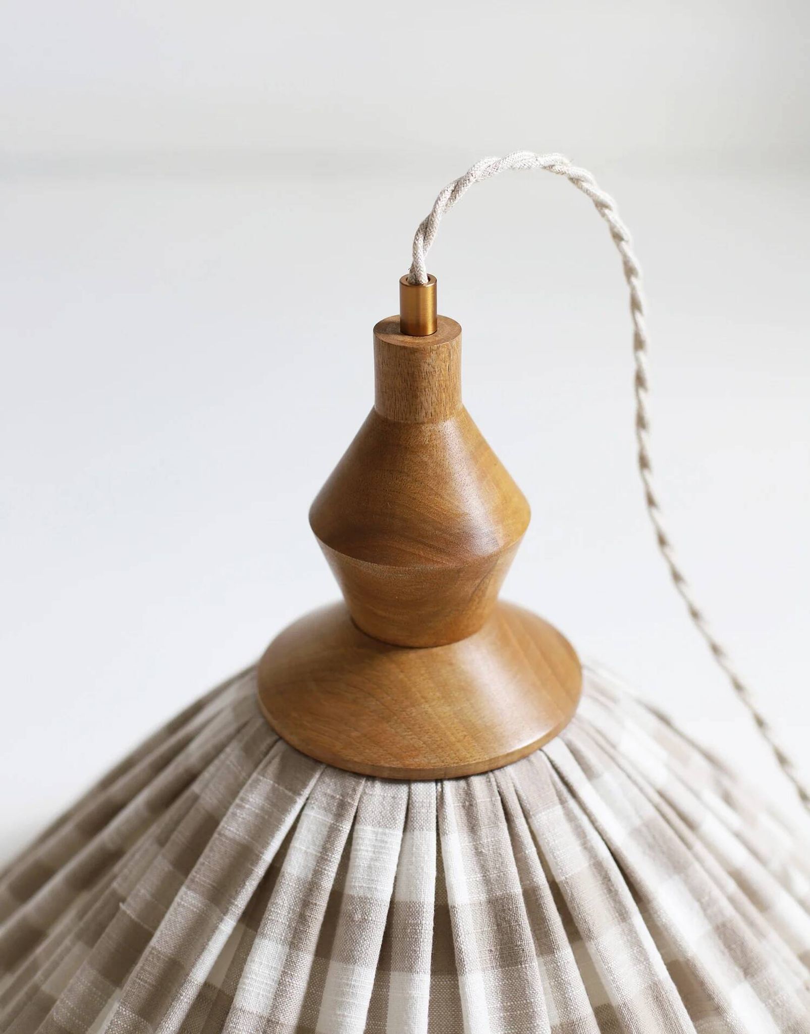 "Olga" pleated pendant light in beige checked fabric and turned wood finish