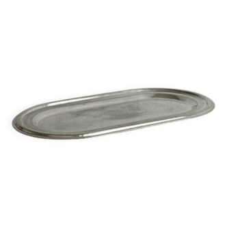 Small antique tray made of lightweight metal.