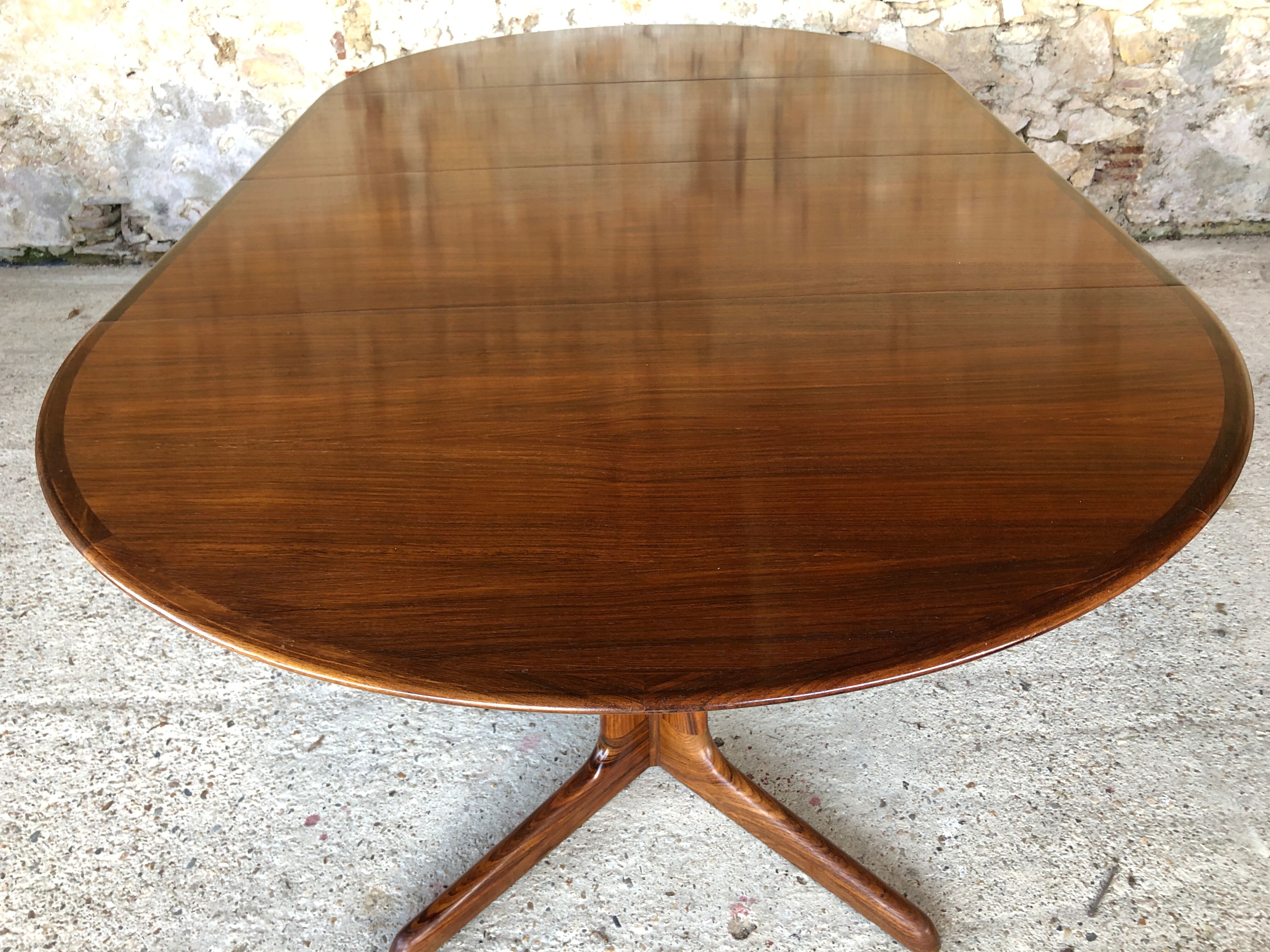 Expandable Scandinavian rosewood dining table by CJ Rosengaarden, circa 60's
