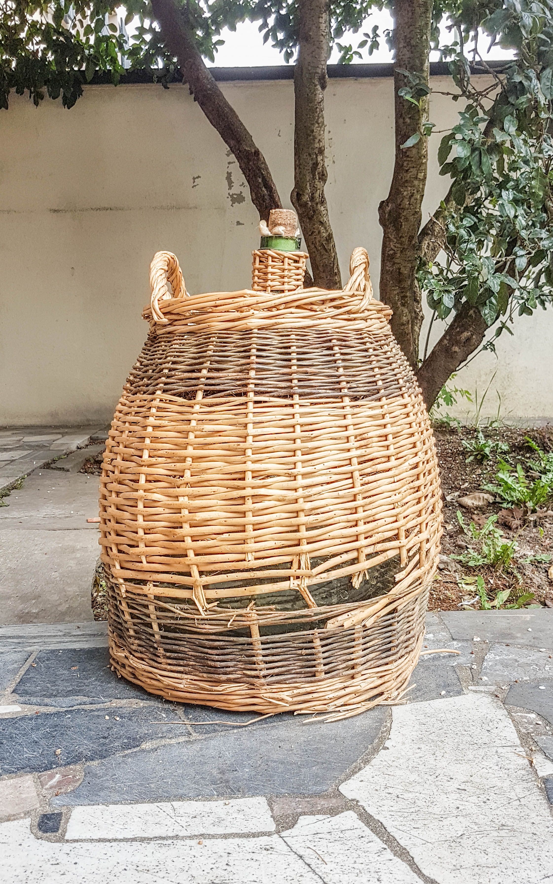 Demijohn covered with wicker