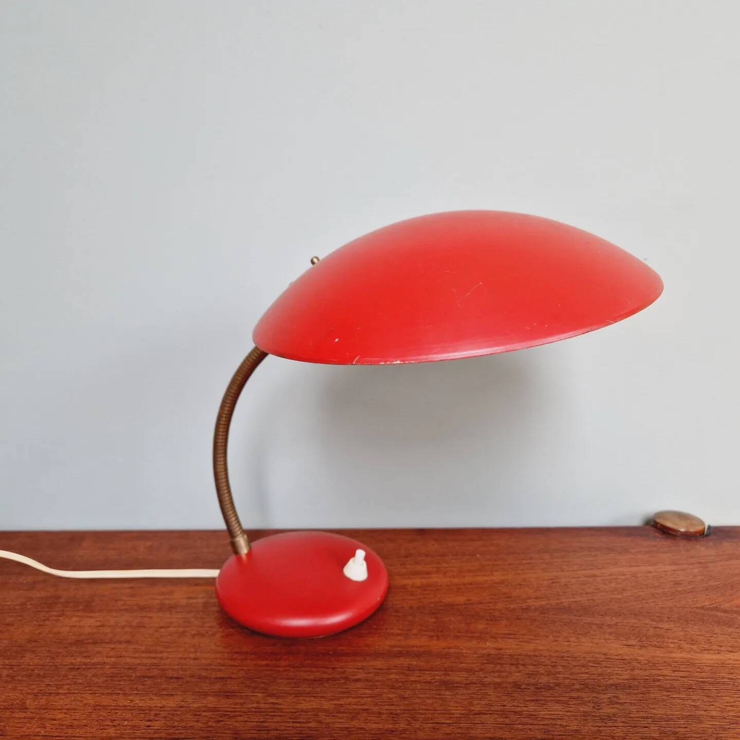 Articulated lamp in red lacquered metal, 1960s