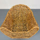 Sculptural woven rattan armchair, organic design from the 1970s.