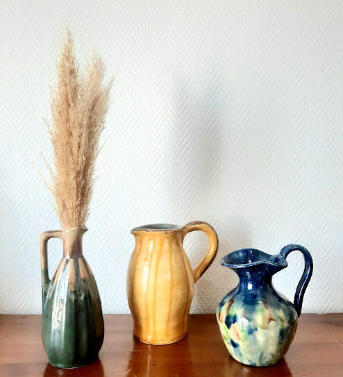 Set of art nouveau ceramic pitchers