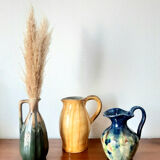 Set of art nouveau ceramic pitchers