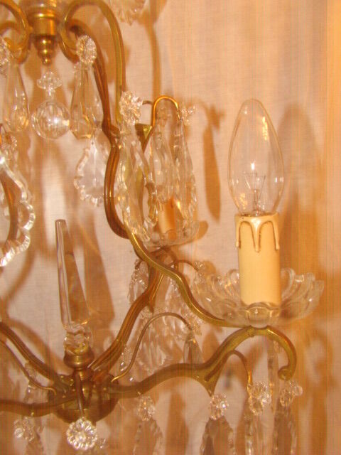 crystal chandelier type with a 4-arm light cage