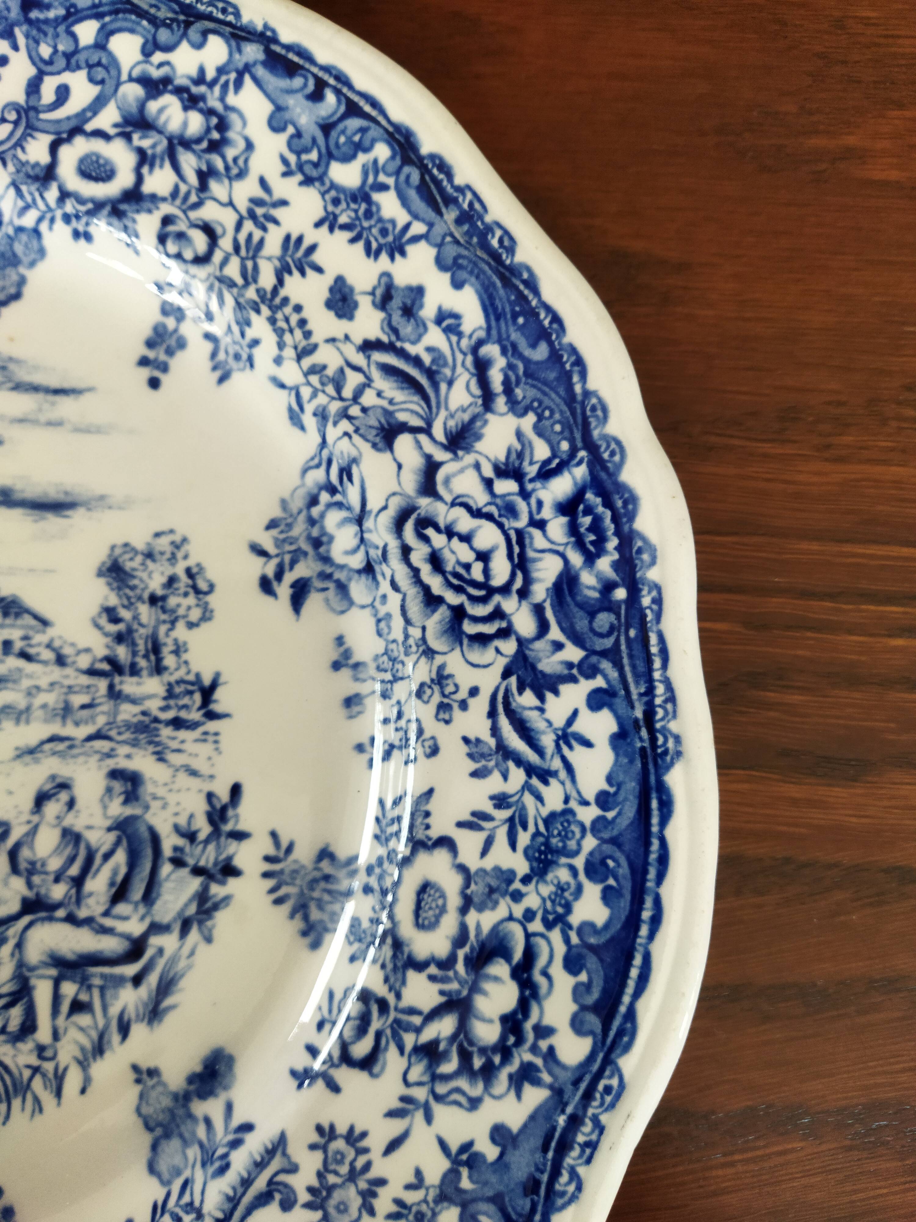 8 blue & white plates