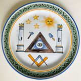Old collection plate on The Masonic theme