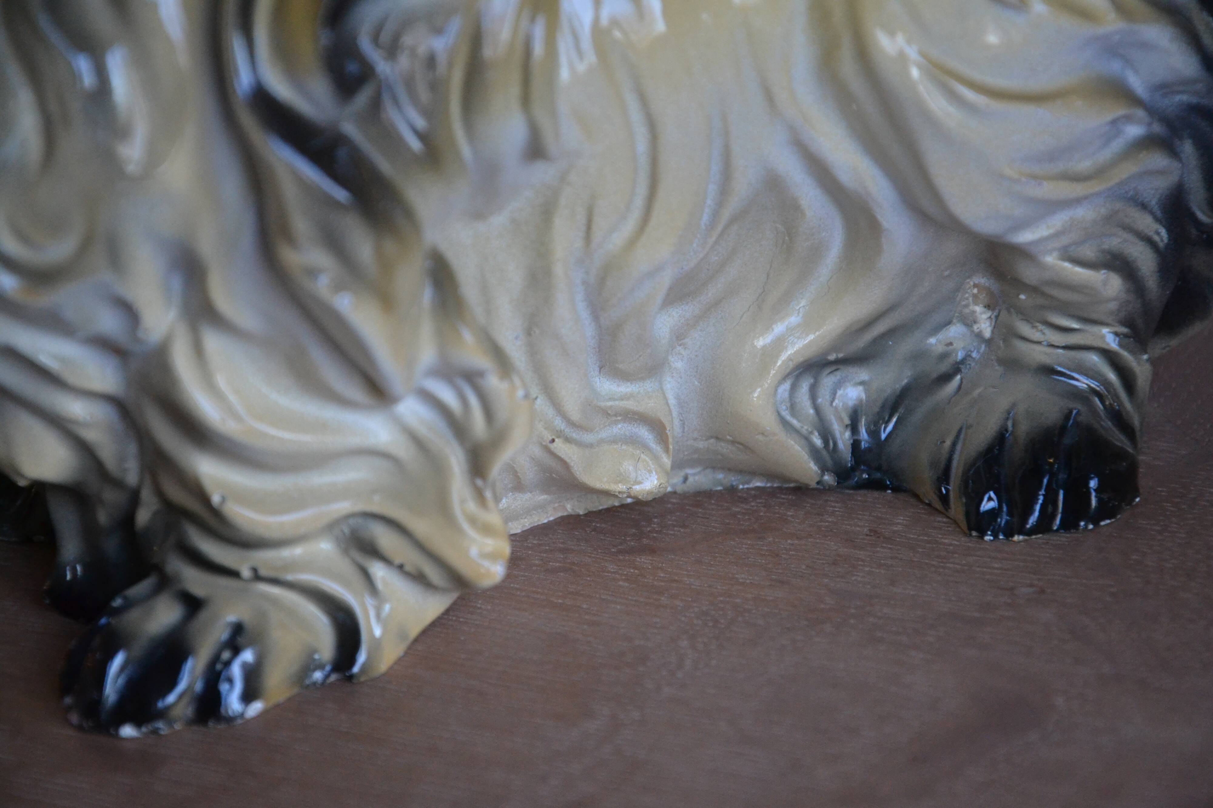 Ceramic dog sculpture from the 1940s-50s.